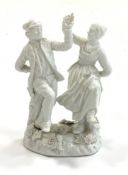 Mid 18th Century Meissen blanc de chine group of two dancers in peasant costume and on a floral