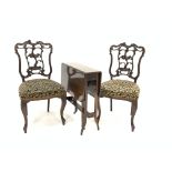 Pair late Victorian carved mahogany dining chairs, with scrolled decoration,