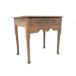 17th century oak side table, octagonal moulded top above single frieze drawer,