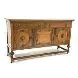 Early 20th century oak sideboard, two drawers above three cupboards,