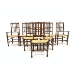 Set eight (6+2) stained beech and elm spindle back dining chairs, carved cresting rail,