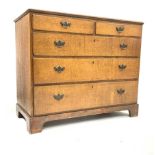 George III oak chest of two short and three long graduated drawers, on replaced pine bracket base,