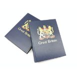 Two large stamp albums containing used Great British stamps, including pre-decimal, higher values,