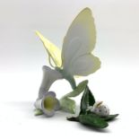 Herend model of a butterfly and flowers, H15cm and a small Herend model of a rabbit on leaves,