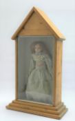19th century wax shoulder head doll with applied hair and inset glass eyes,