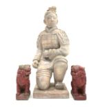 Garden figure of kneeling terracotta soldier, (H78cm) and a pair of red painted dogs of Foo,