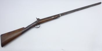19th century percussion cap muzzle loading gun, the walnut stock with checkered fore-end,