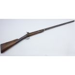 19th century percussion cap muzzle loading gun, the walnut stock with checkered fore-end,