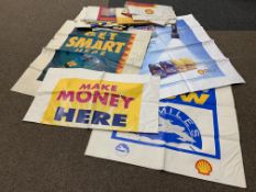 Uncut advertising posters for display at Shell petrol stations,