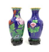Pair of 20th Century Chinese cloisonne vases decorated with flowers and leaves on a blue ground and
