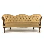 Victorian rosewood three seat settee, upholstered in deep buttoned fabric,