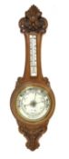 Early 20th century oak cased aneroid wheel barometer and thermometer,