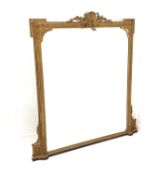Large 19th century gilt framed overmantel mirror with beaded moulding and a foliate and ribbon