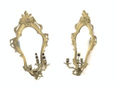Pair early 20th century brass two branch mirrored back wall sconces,