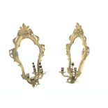 Pair early 20th century brass two branch mirrored back wall sconces,