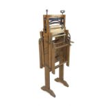 Late 19th century Anchor brand folding bench clothes wringer, no.
