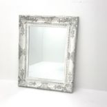Rectangular wall mirror in white swept frame, W74cm,