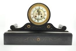 Victorian slate mantel clock with incised scrolled gilt detail,