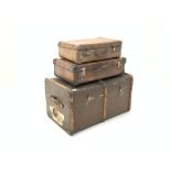 Early 20th century wood bound steamer trunk, (W82cm) together with two leather suitcases,