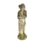 Composite stone garden statue of a bathing lady, on circular base,