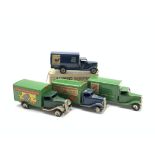 Four Tri-ang Minic clockwork tin-plate delivery vans - Carter Paterson, Southern Railway,