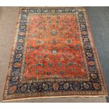Persian design ground carpet, red field with all over trailing foliate design,