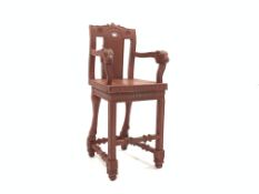 20th century Chinese design carved and painted hardwood high chair, ram head arm terminals,