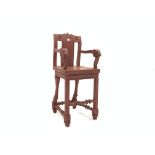 20th century Chinese design carved and painted hardwood high chair, ram head arm terminals,