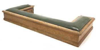 Early 20th century oak club fender with green leather upholstered seat, on recessed castors, W177cm,