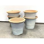 Five glazed terracotta flower pot planters,