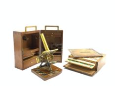 19th Century brass microscope in a fitted mahogany case,