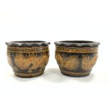 Pair of Chinese design terracotta planters, decorated with relief moulded dragons,