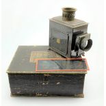 A boxed German made Magic Lantern with brass plaque E.P.