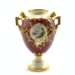 Coalport twin handled vase, red ground with gilt decoration, painted by E.O.