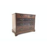 George III inlaid mahogany chest of two short and three long graduating drawers,