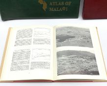 Cased copy of the National Atlas of Wales pub.