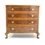 Small bowfronted burr walnut chest of four graduated long drawers,