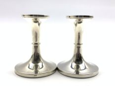 Pair of dwarf silver candlesticks on circular bases H10cm Birmingham 2003 Maker Broadway & Co
