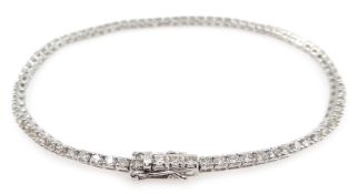 White gold round brilliant cut diamond line bracelet, stamped 18K, diamond total weight approx 2.