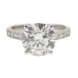 18ct white gold single stone diamond ring, with diamond set shoulders, hallmarked,