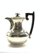 Silver hot water jug with ebonised handle and lift Sheffield 1959 Maker Viners 22.