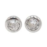 Pair of 9ct white gold cubic zirconia stud earrings,
