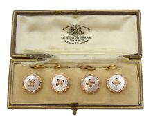 Set of gold and gilt and mother of pearl dress studs, retailed by The Goldsmiths Company Ltd,