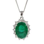 18ct white gold oval emerald and diamond cluster pendant necklace, hallmarked, emerald approx 3.