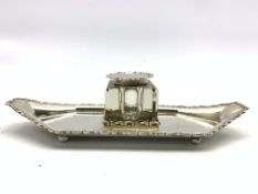 Edwardian silver navette shape inkstand with scroll edge decoration and with a square glass block