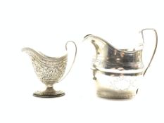 George III silver cream jug with reeded handle and engraved decoration, marks rubbed,