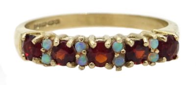 9ct gold garnet and opal half eternity ring,