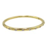 18ct gold hinged bangle set with nine diamonds Condition Report & Further Details