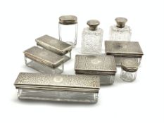 Set of nine Victorian silver mounted and cut glass toilet bottles with engraved floral and foliate