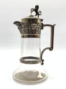 Edwardian clear glass and silver mounted claret jug with domed hinged lid,